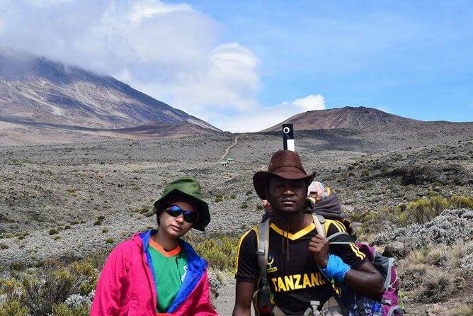 5 Days Marangu Route - Mount Kilimanjaro Trek - Day 6 descent: Mandara lunch, rainforest return, and finally Moshi shower time