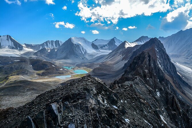 8 Days Private Tour at Lenin Peak Base Camp Trek - Day 2 over the red-rock gorge route to the high pass