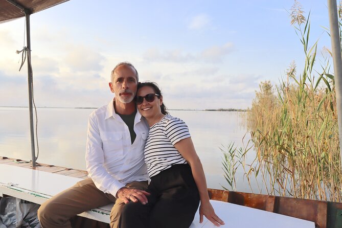Albufera Private Day Tour: Paella, Boat Cruise and Nature Walk - Stop 5: El Palmar sunset boat cruise—calm water, flora, and wildlife