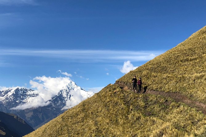 Ancascocha Trek To Machu Picchu 4 Days And 3 Nights - Perolniyoc waterfall and a cliff-top Inca site