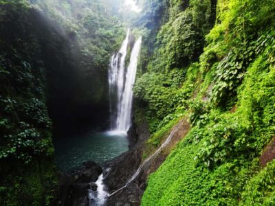 Bali: Sambangan Waterfalls Trekking, Sliding, & Jumping Trip - The local tasting stop: cocoa, young coconut, and a Balinese instrument