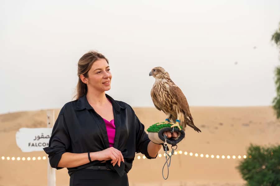 Dubai: Half-Day Camel Trekking with Al Marmoom Breakfast - Falcon photos and Arabian clothing: the fun cultural costume layer