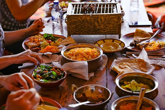 Dubai Sunset Camel Trekking With BBQ Dinner at VIP Camp - Entertainment Schedule: Tanoura, Belly Dance, Fire, Falcons, and More
