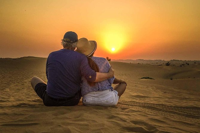 Dubai Sunset Camel Trekking with Shows & BBQ Dinner - Camel Caravan: Riding Time, Sunset Views, and Falcon Photo Moments