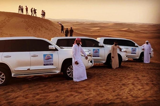 Early Morning Desert Safari With Camel Trekking Experience - Camel trekking and sandboarding: short, focused, and included