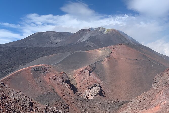 Etna excursion 3000 meters with 4x4 cable car and Trekking - Return by cable car over volcanic sand: ending high and riding the view down