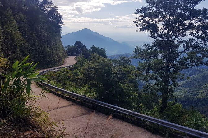 Explore Bach Ma National Park - Trekking with Small Group Tour - Reaching the peak area near 1,450m and the Hai Vong Dai Watch Tower