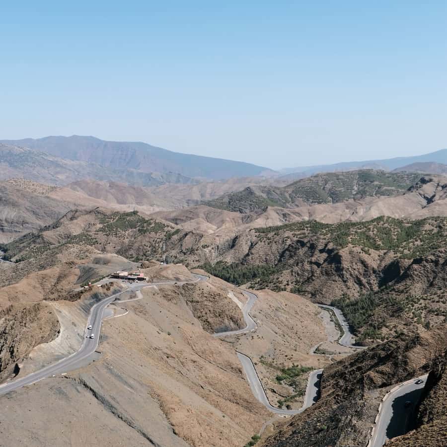 From Fes: 3 Day Magical Desert Camel Trek To Marrakech - Midelt and the road into desert: gorges, valleys, and that slow-thinning vegetation