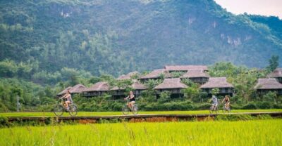 From Hanoi: Mai Chau Valley & Hill Tribes 2-Day Trek Tour - Day 1: photo stop views, a traditional lunch, then cycling with a private guide