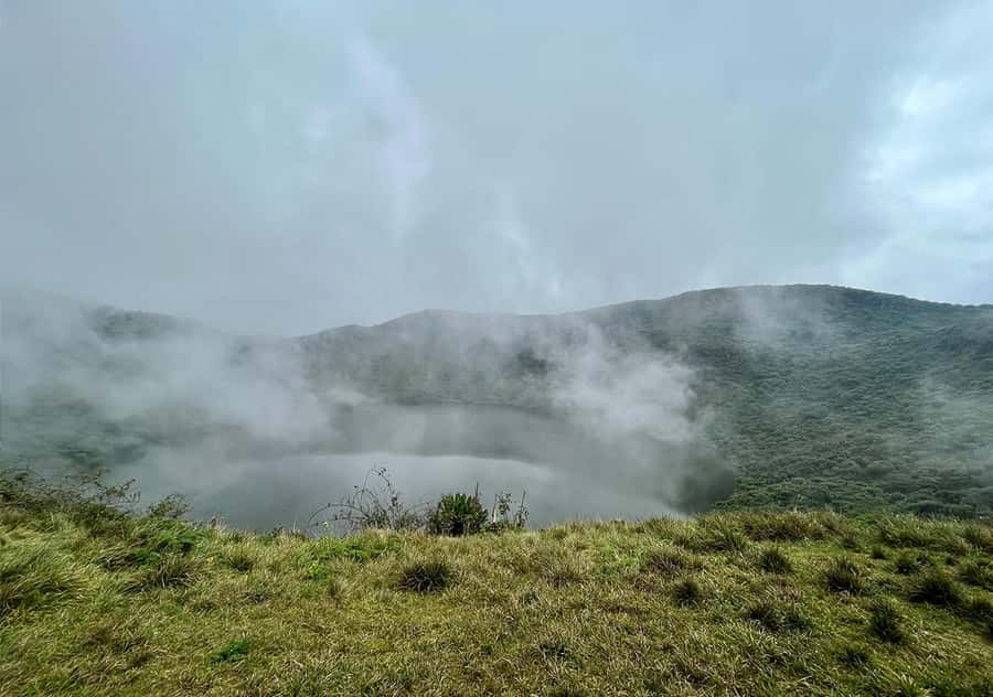 From Kigali: Bisoke Summit Trek, Crater Lake 1 Day Safari - The descent at 2:00 PM: timing, knees, and smart stops