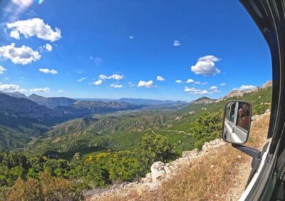 From Orosei or Dorgali: Trek to Gorropu with Panoramic Views - Wading into the Flumineddu River and walking under old oaks