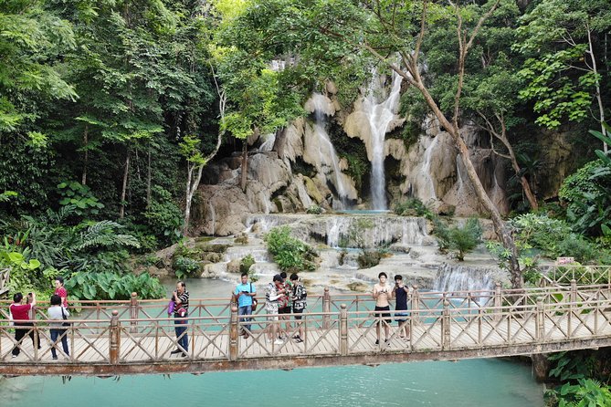 Full Day Trek to Kuang Si Waterfalls, Remote Village - Kuang Si Falls: swimming time plus the nearby Bear Rescue Center and Hmong village