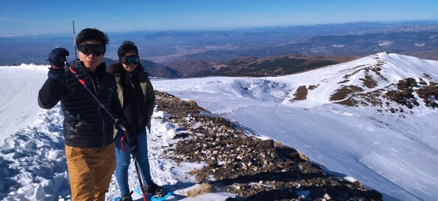 Granada: Sierra Nevada Veleta Peak Trek with Lunch - Sierra Nevada terrain: snowshoes in winter, sticks in summer
