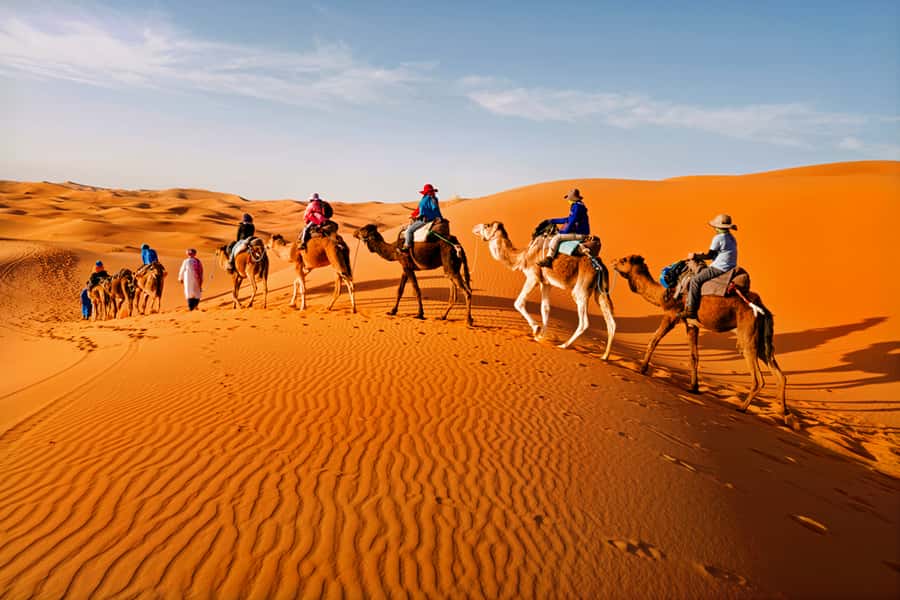 Merzouga: Overnight Camel Trek with Sandboarding - Entering Erg Chebbi Dunes from Ksar Tanamouste (Meet Hassan Zit)