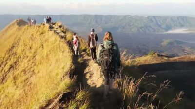 Mount Batur Sunrise Trek & Hot Springs Tour - Trekking up in the dark: headlamp, poles, and a steady guide
