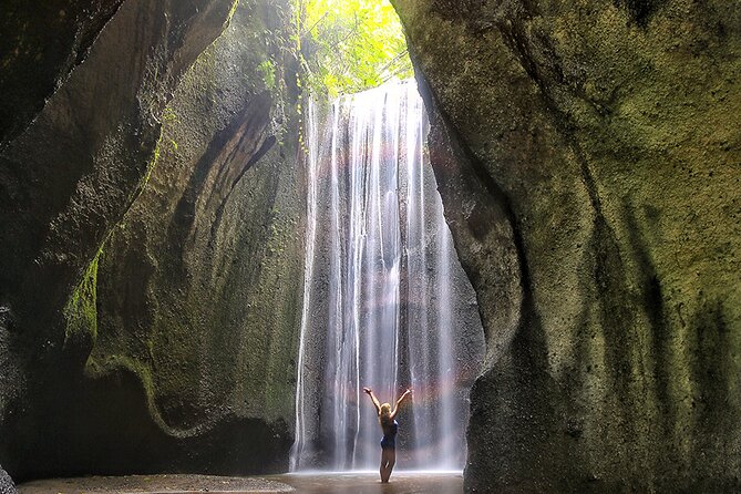 Mount Batur Sunrise Trekking and Hidden Waterfall - Tukad Cepung: the cave waterfall and the sun-ray window
