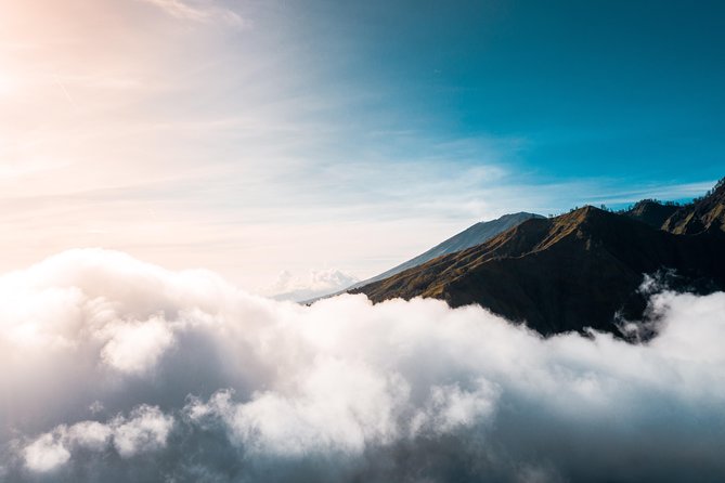 Mount Batur Sunrise Trekking and Rice Terrace Adventure - Sunrise Moment: Breakfast, Hot Drink, and the View at the Crater Rim