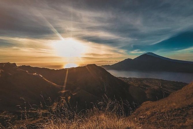 Mt batur Sunrise Trekking and Natural Spring Tour - Gear that actually helps: torches, poles, and the dark-to-dawn switch