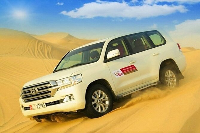 Sunset Camel Trek & Red Dunes Safari with BBQ at Al Khayma Camp From Dubai - Starlit BBQ at Al Khayma: Belly Dance and Tanoura After Dinner