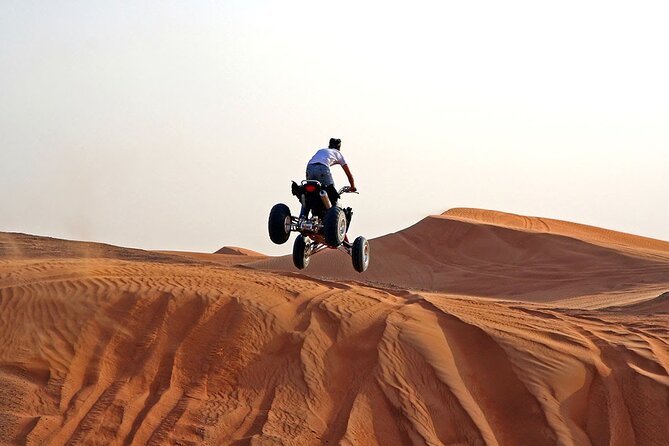 Sunset Quad Bike Safari With Camel Trek, Live Shows and Dinner - The heart of the tour: 30 minutes on red dunes