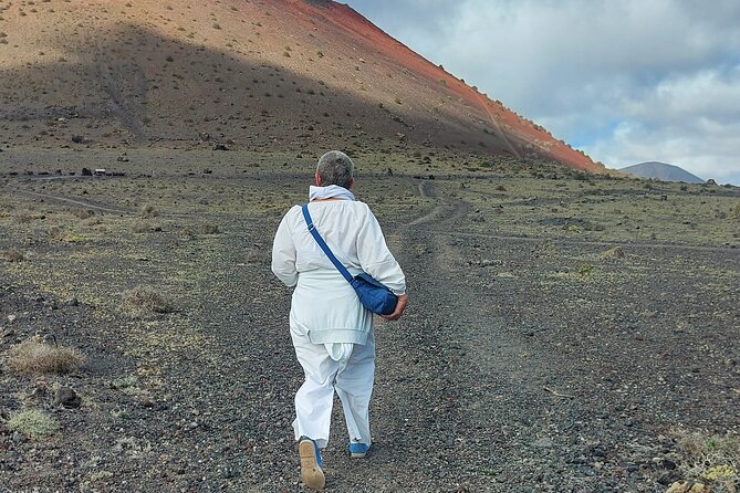 Timanfaya National Park Trekking with a Typical Canarian Snack - Ortiz Volcano: reading the layers of ejected material