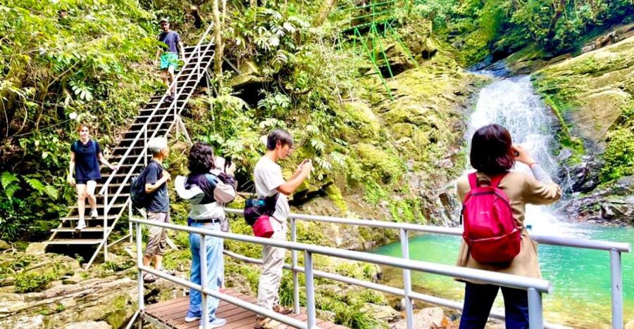 TOUR TREKKING HUE - BACH MA NATIONAL PARK DAILY - Rhododendron Waterfall: 300m of Power and the Mountain Backdrop