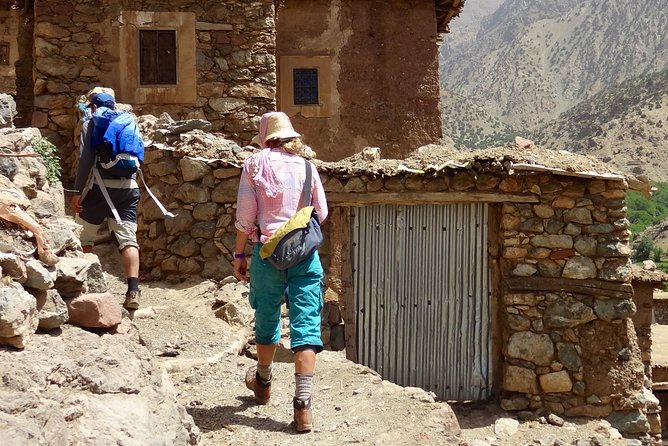 Trekking and Hiking in Morocco 2 Day trek in Atlas Mountains Berber villages - Day 1: Tizi Mzik pass, Tamsoulte waterfalls, and a long descent to Tizi Oussem