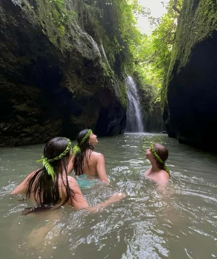 Ubud: Trekking Through Rivers & Forests to Three Waterfalls - Optional canyon jump and a natural water slide